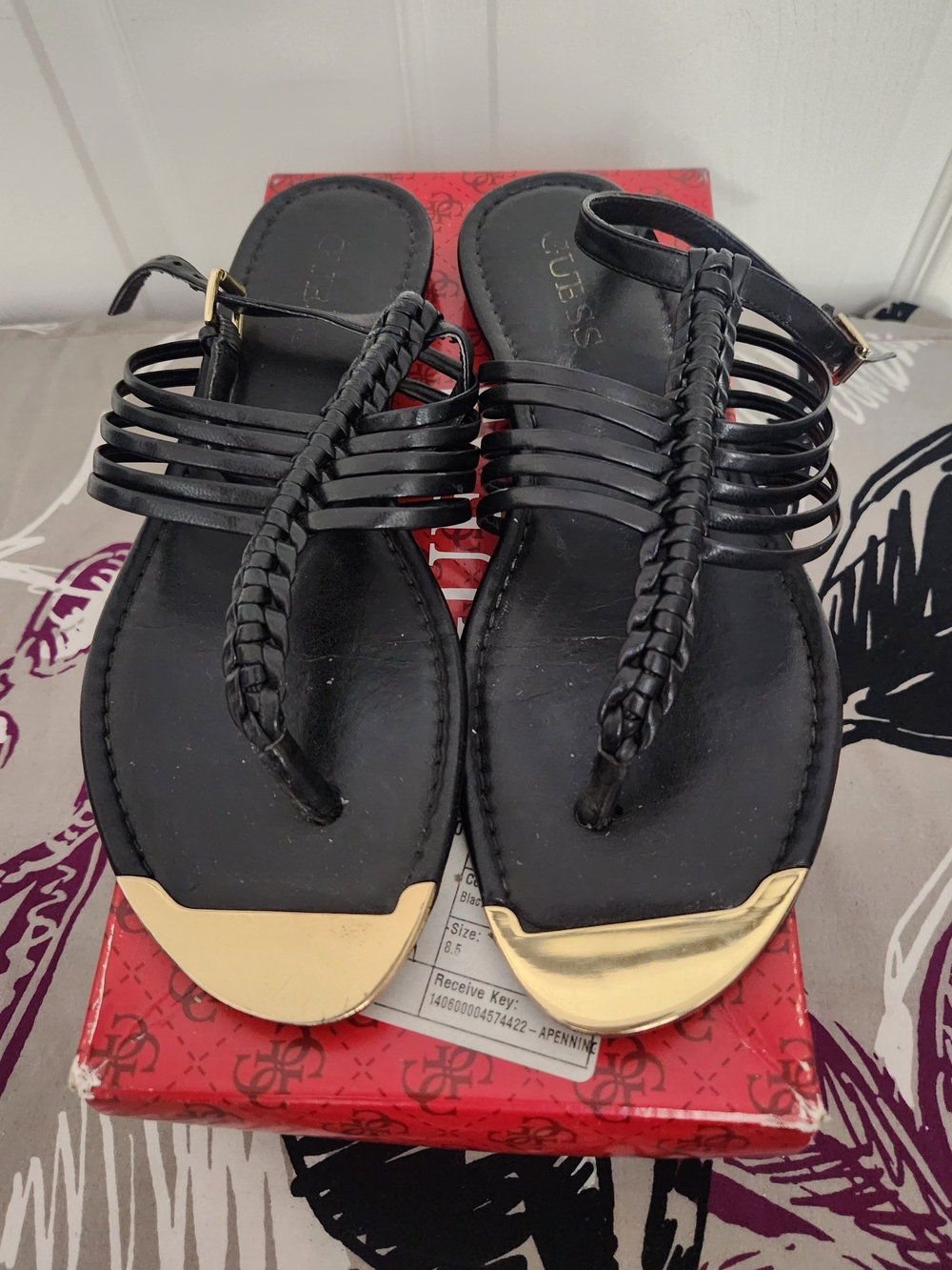 GUESS Black Braided Thong Sandals with Gold Toe Caps